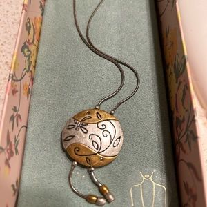 Chico’s cute vintage necklace.  Both gold and silver.
